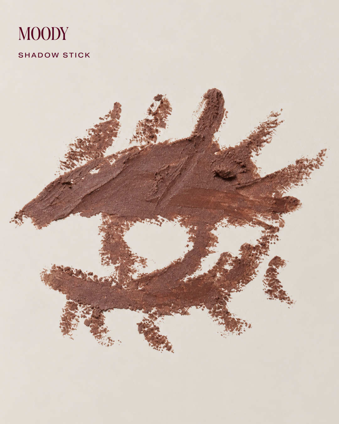 Shadow Stick swatch in Moody, a soft mauve brown