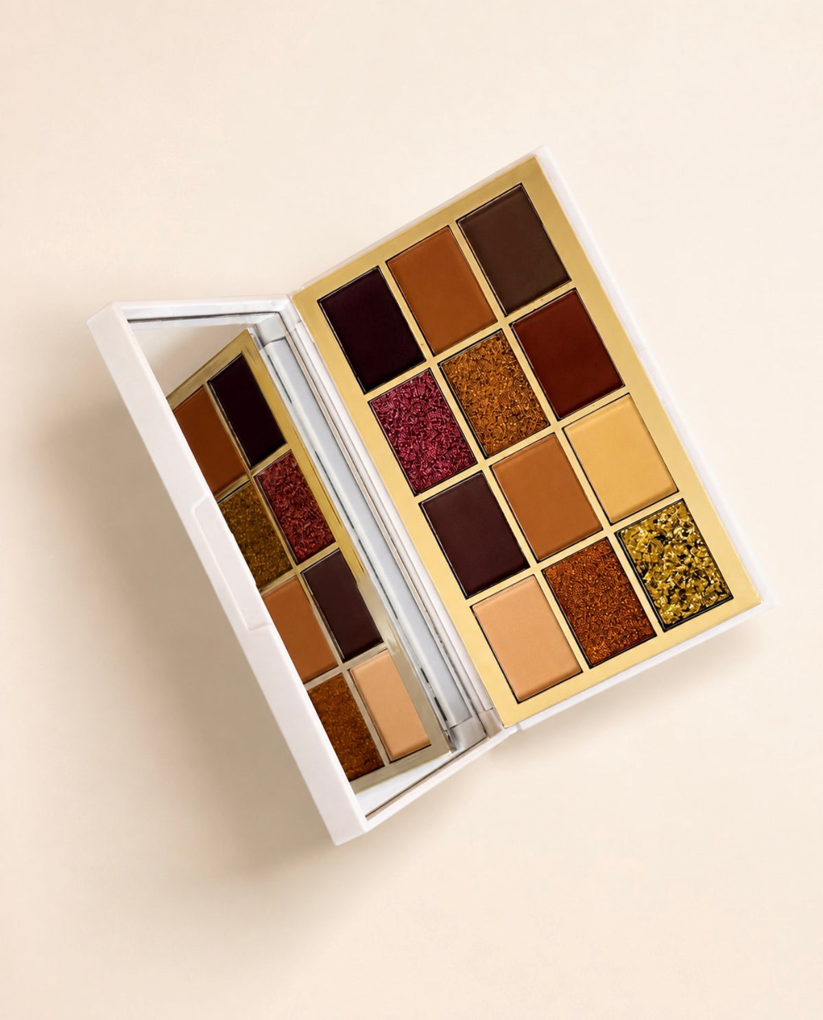 Copperhead Eyeshadow Palette open, showing twelve warm-toned shades